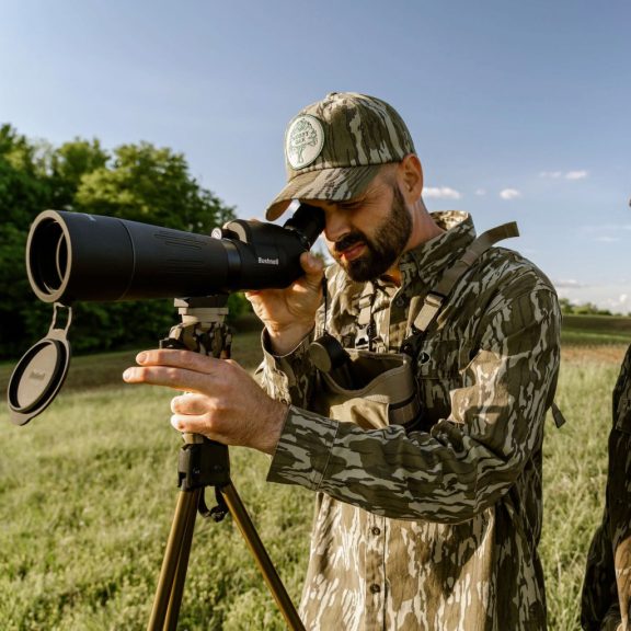 Trepied Vânătoare Primos Vantage Camo – Picioare Telescopice Flip-Lock, Cap Rotativ V-Yoke și Camuflaj Mossy Oak